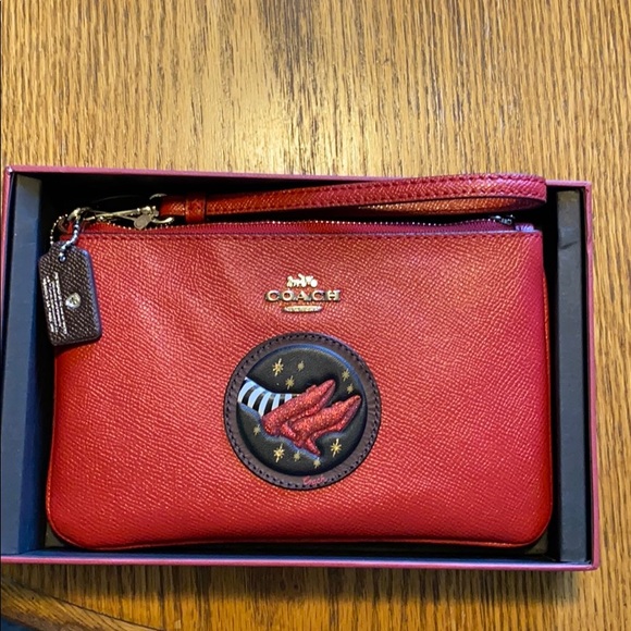 coach wizard of oz wristlet
